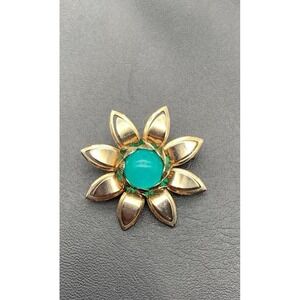 Vintage Gold Tone Small Flower Brooch With A Teal Blue Iridescent Cabochon